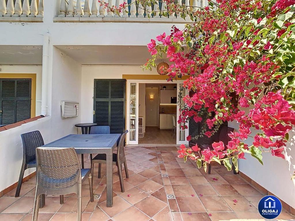 Can Alfredo, Apartamento Cala en Bosch con piscina, terraza y jardín privado Can Alfredo, Apartamento Cala en Bosch con piscina, terraza y jardín privado