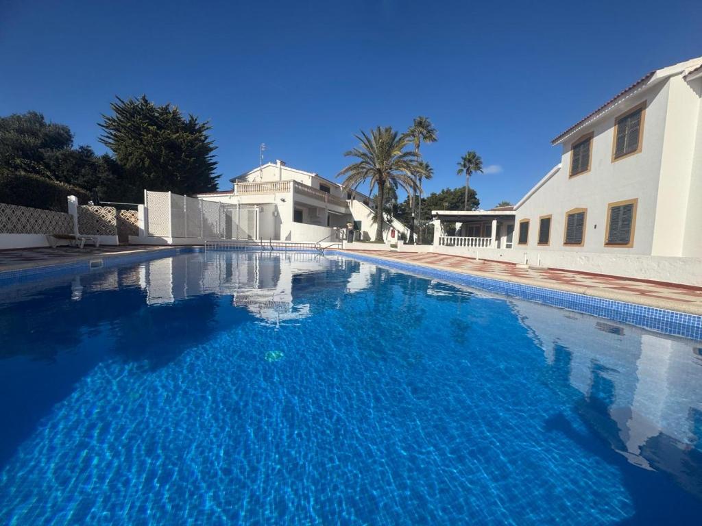 Can Alfredo, Apartamento Cala en Bosch con piscina, terraza y jardín privado Can Alfredo, Apartamento Cala en Bosch con piscina, terraza y jardín privado